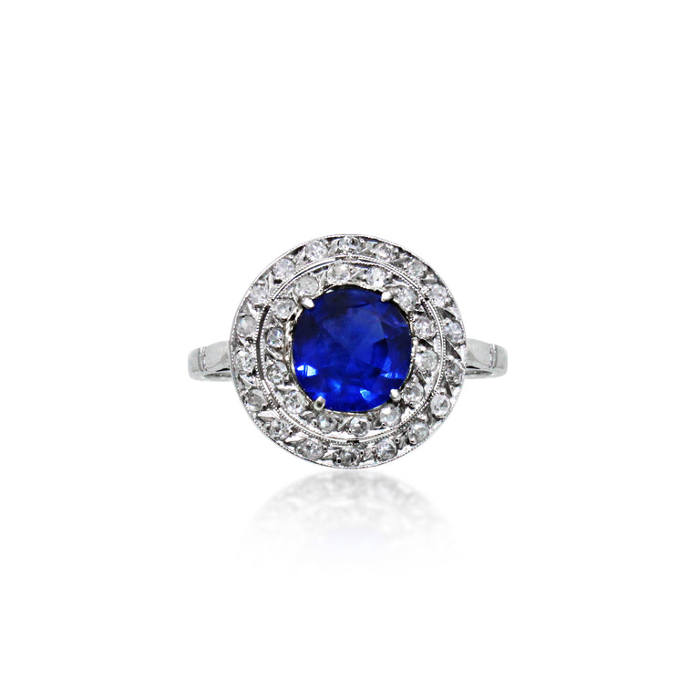 Vintage Round Cut Blue Sapphire and Diamond Halo Ring