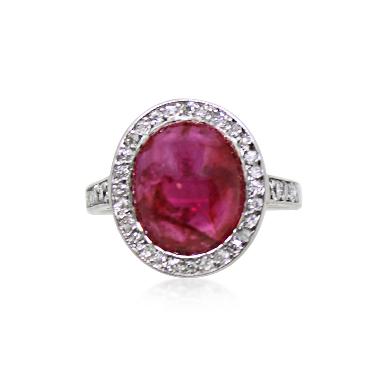 Oval Ruby Cabochon and Halo ring in Platinum