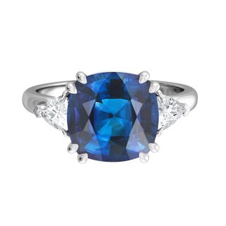 Blue Sapphire and Diamond cushion Trilogy Platinum ring